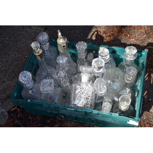 1071 - A quantity of cut glass decanters. 