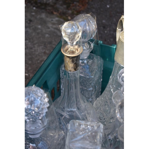 1071 - A quantity of cut glass decanters. 