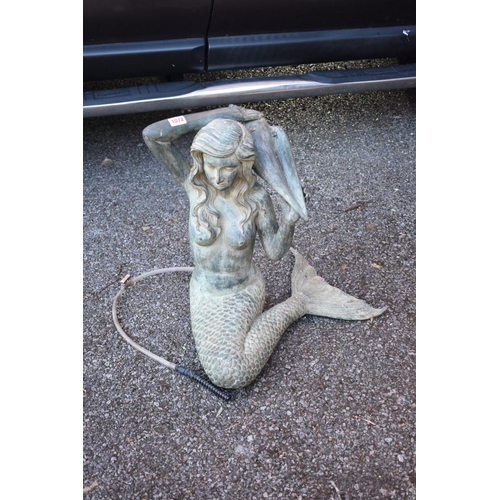 1072 - A patinated metal mermaid water feature.