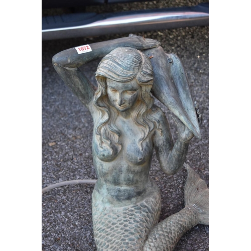 1072 - A patinated metal mermaid water feature.