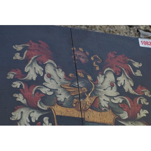 1082 - An antique armorial painted oak panel, inscribed with motto 'Semper Sapit Suprema', 45.5 x 35.5... 