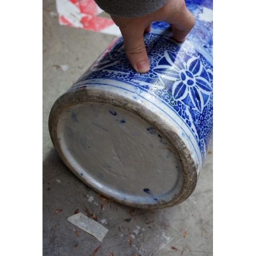 1083 - A Japanese blue and white stickstand, 61cm high, (cracked to rim). 