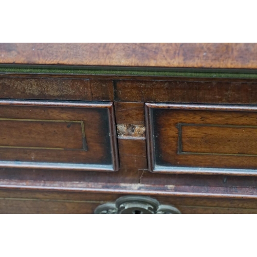 1086 - An unusual George III mahogany and brass inlaid bureau, in the manner of John Channon, the fall encl... 