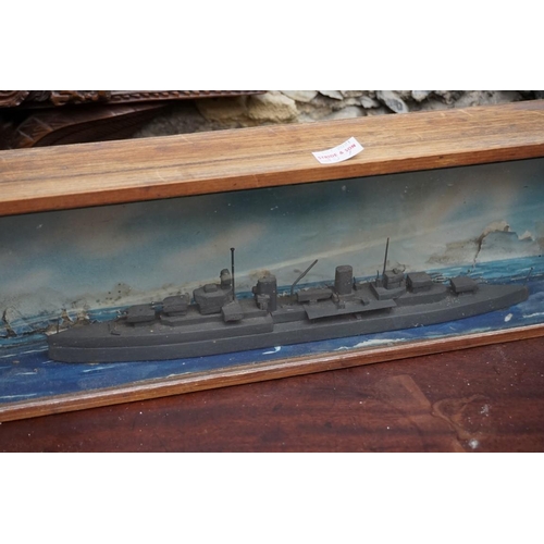 1087 - An old pond yacht, the hull 62.5cm; together with another diorama of a battleship, 49.5cm wide. (2)... 