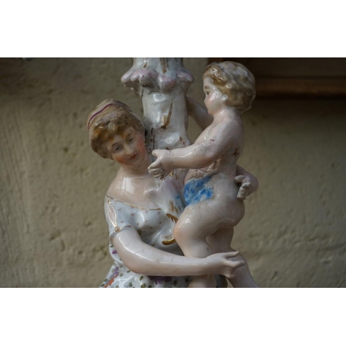 1104 - A mixed group of 19th century and later pottery and porcelain, to include: a small pair of Meissen f... 