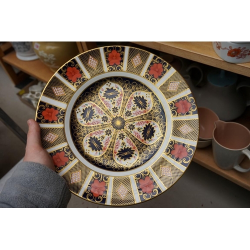 1107 - A small collection of cottage models; together with a Royal Crown Derby Imari dinner plate; and othe... 