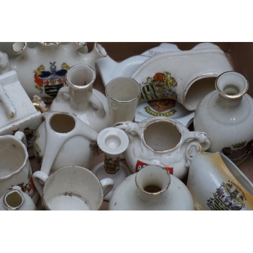 1121 - A quantity of crested china models.   