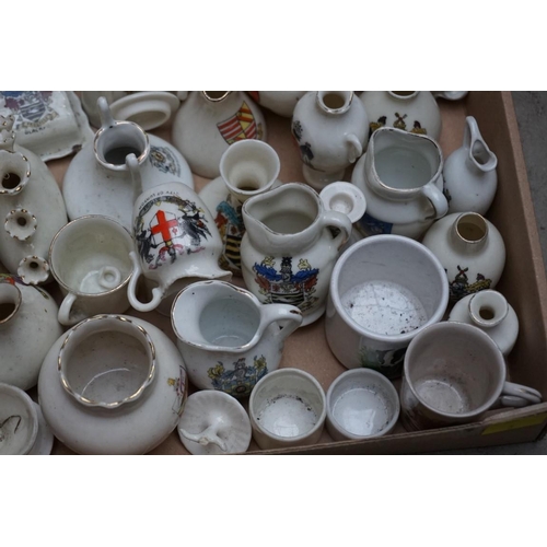 1121 - A quantity of crested china models.   