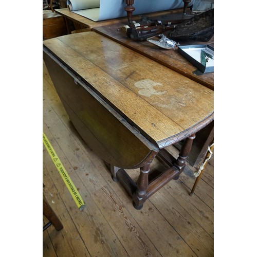 1063 - All Proceeds to St Wilfrid's Hospice: an antique oak gateleg table, 131cm wide.