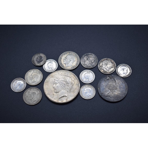 151 - Coins: a US 1925 Peace dollar, Philadelphia Mint; together with a small quantity of UK silver coinag... 