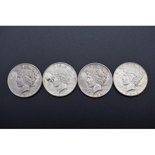 152 - Coins: four US silver peace dollars, 1923. (4)