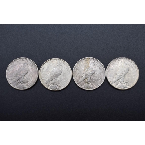 152 - Coins: four US silver peace dollars, 1923. (4)