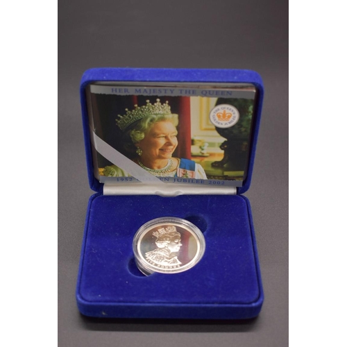 161 - Coins: a cased Elizabeth II 2002 Golden Jubilee 1oz silver proof £5 coin, with booklet.... 