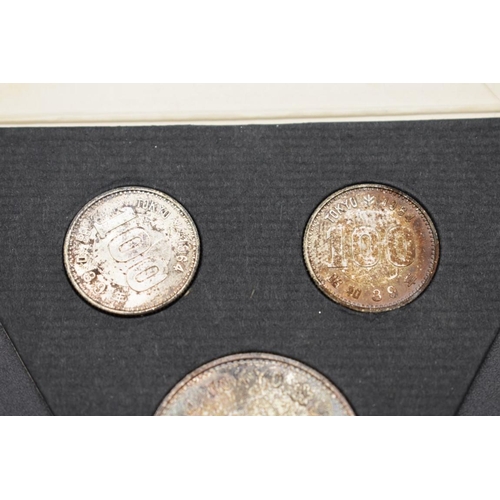 165 - Coins: a Mitsui Bank 1964 Tokyo Olympics three coin memorial set.