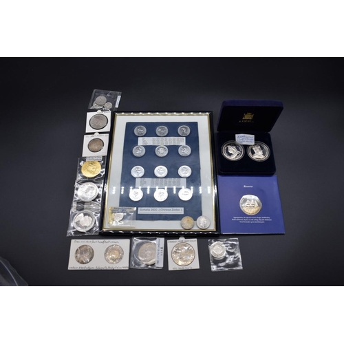 169 - Coins: a small quantity of world coins and medallions.