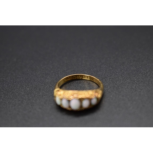 70 - An 18ct gold and opal five stone ring, total weight 2.4g, size K.