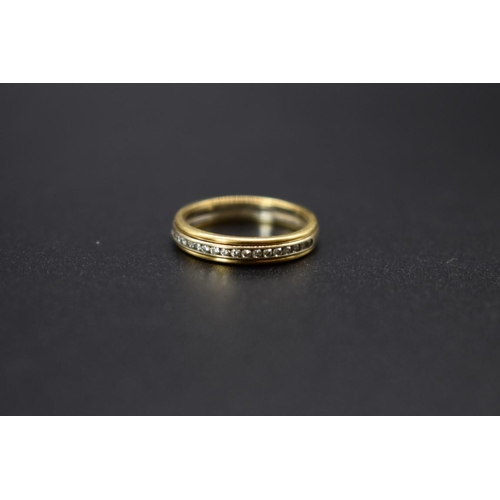 72 - An 18ct gold diamond half eternity ring, total weight 2.6g, size H 1/2.