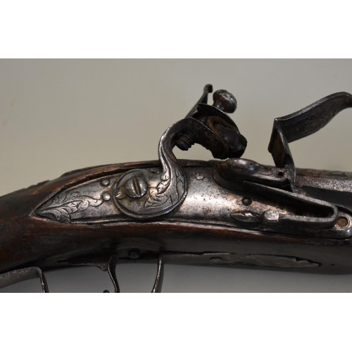 1788 - An antique flintlock pistol, having 33cm barrel, indistinctly signed to the barrel.