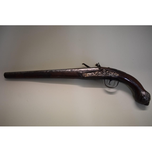 1788 - An antique flintlock pistol, having 33cm barrel, indistinctly signed to the barrel.