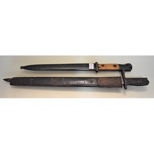 1801 - Two old bayonets and scabbards, (s.d. to each scabbard).