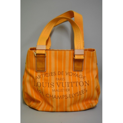 1809 - Louis Vuitton: an orange canvas 'Articles de Voyage' tote bag, with interior zip pocket, in dustbag.... 