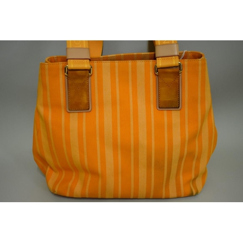 1809 - Louis Vuitton: an orange canvas 'Articles de Voyage' tote bag, with interior zip pocket, in dustbag.... 