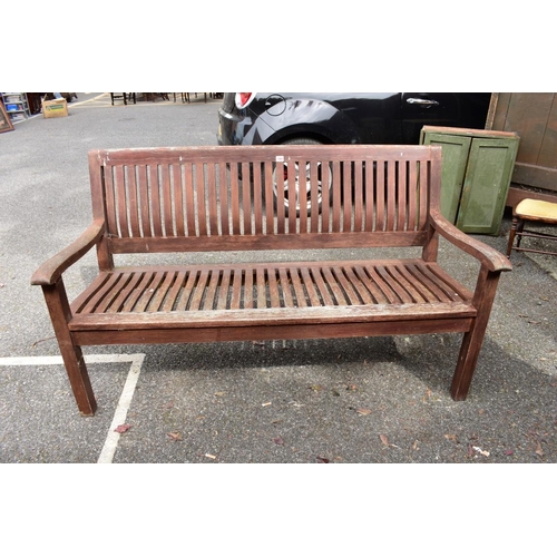 1064 - A wood garden bench, 153cm wide. Collection of this lot is strictly by appointment on Saturday 26th ... 