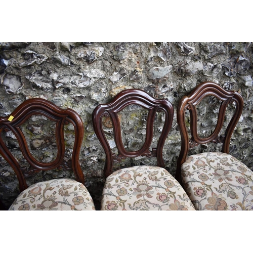 1069 - A set of six Victorian mahogany dining chairs. Collection of this lot is strictly by appointment on ... 