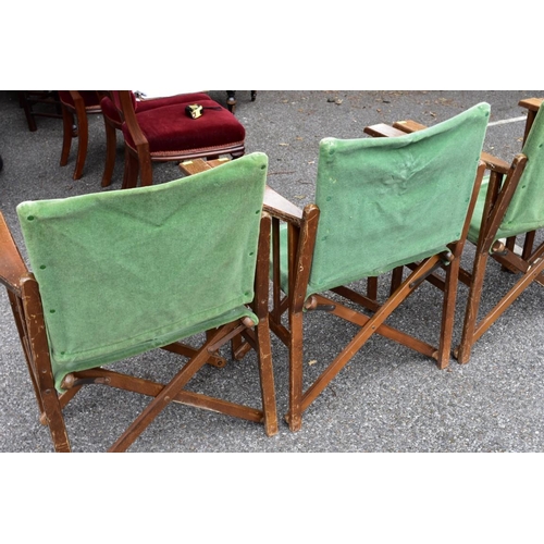 1070 - A set of four directors' style folding chairs, 84cm high. Collection of this lot is strictly by appo... 