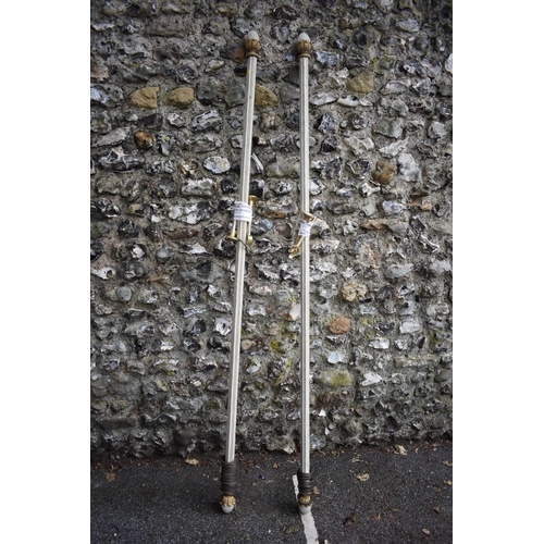 1071 - A pair of curtain rails, 204.5cm long. Collection of this lot is strictly by appointment on Saturday... 