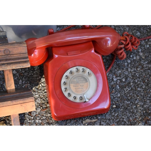 1078 - A vintage red telephone; together with two old wood planes and sundry. Collection of this lot is str... 