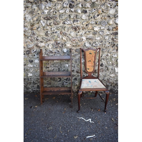 1083 - A circa 1930s bookcase; together with a dining chair. Collection of this lot is strictly by appointm... 