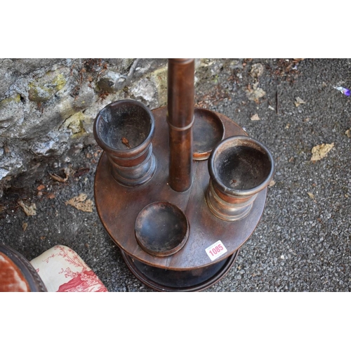 1085 - An old stool; together with one other stool and a smokers companion. Collection of this lot is stric... 