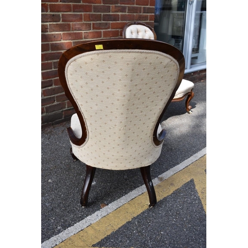 1090 - Two cream upholstered nursing chairs. Collection of this lot is strictly by appointment on Saturday ... 