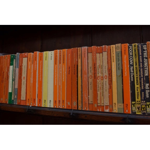 467 - PENGUINS: a collection of 70 Penguin editions of novels by Graham Greene, plus 60 other vintage... 