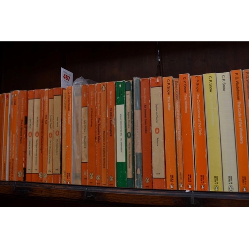 467 - PENGUINS: a collection of 70 Penguin editions of novels by Graham Greene, plus 60 other vintage... 