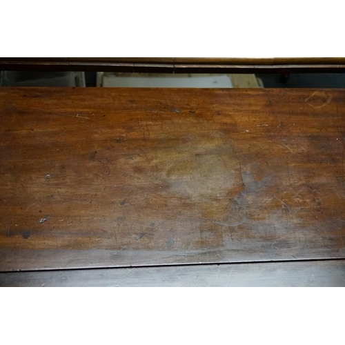 1694 - An Irish George III mahogany drop leaf table, indistinctly labelled 'Robert Strahan, Cabinet Makers ... 