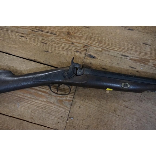 1700 - An antique percussion musket; together with an antique Indian matchlock musket.