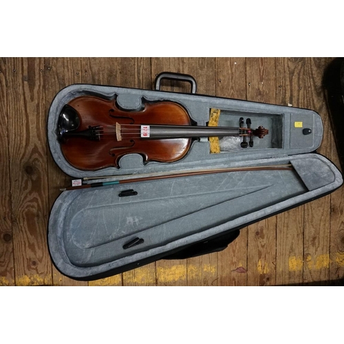 1709 - An old violin, with 14in two piece back, with bow inscribed Czechoslovakia, in padded case.&nbs... 