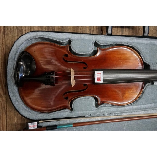 1709 - An old violin, with 14in two piece back, with bow inscribed Czechoslovakia, in padded case.&nbs... 