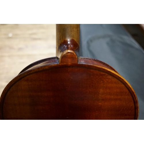 1709 - An old violin, with 14in two piece back, with bow inscribed Czechoslovakia, in padded case.&nbs... 