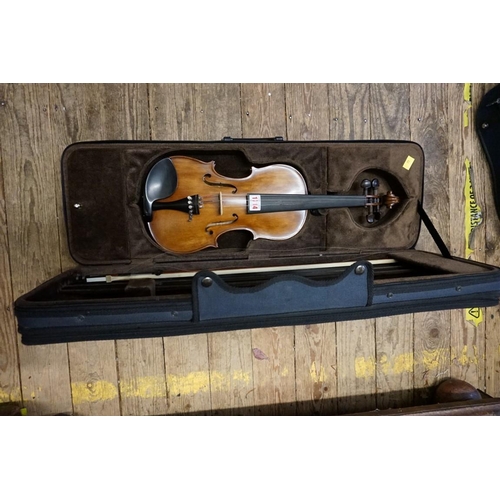 1714 - A Vivaldi model No.MV1416 violin, with 13in two piece back, with bow and padded case.... 