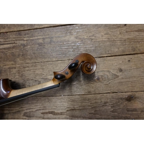 1714 - A Vivaldi model No.MV1416 violin, with 13in two piece back, with bow and padded case.... 