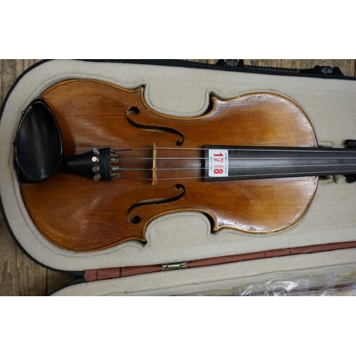 1718 - An old violin, labelled 'J.H.Z. No 4008', with 14in two piece back, with two bows and padded case.&n... 