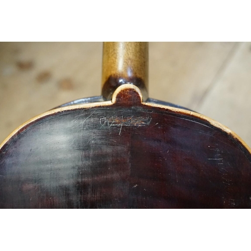 1719 - A antique German violin, labelled 'Antonius Stradivarius', with 14in two piece back, with bow and eb... 