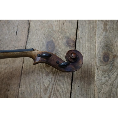 1720 - An antique Continental violin, labelled 'Nicolaus Amatus,...', with 14in one piece back, with bow an... 