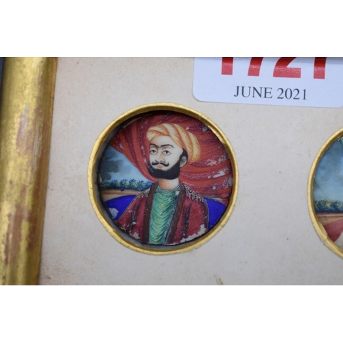 1721 - Indian School, a pair of portrait miniatures, on ivory, 2.8cm diameter, framed as one.... 