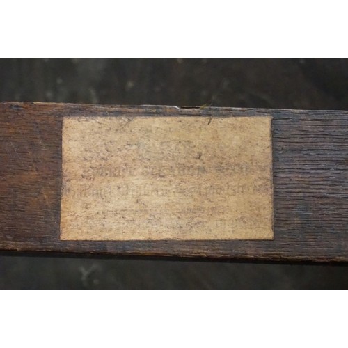 1694 - An Irish George III mahogany drop leaf table, indistinctly labelled 'Robert Strahan, Cabinet Makers ... 