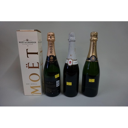 531 - A 75cl bottle of Moet & Chandon NV champagne, in card box; together with another 75cl bottle of ... 