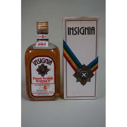 582 - A 75cl bottle of Insignia blended whisky, probably 1980s bottling, in card box.